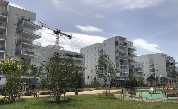 Investir et défiscaliser dans un programme immobilier neuf éligible au dispositif loi PINEL à Villeurbanne-Carré de Soie, à l'Est de Lyon, dans le département du Rhône